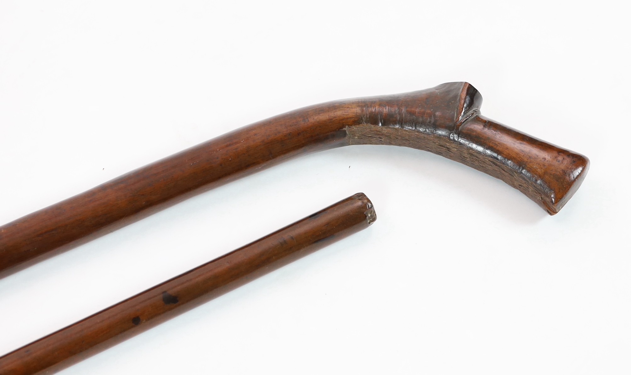 Two Tongan hardwood war clubs, 87cm and 96cm long
